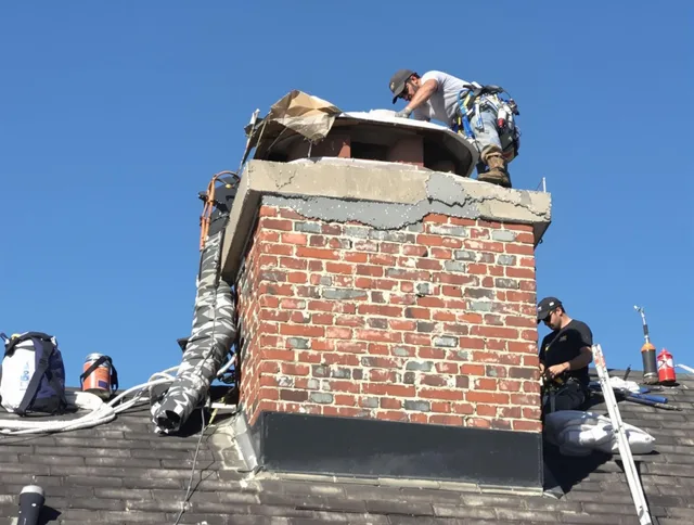 Fort Lauderdale Chimney Sweep installing a custom chimney crown in Fort Lauderdale, FL